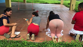 Bikini-Clad Yoga Instructor Leads Stretching Session