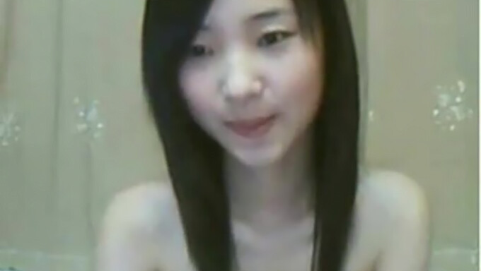 Solo fingering session with a slender Chinese webcam model