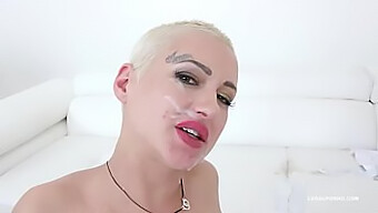 L. Glams, The Tattooed Beauty With A Short Hair, Indulges In Anal Pleasure With Two Cocks