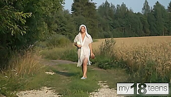 A Charming Girl Indulges In Solo Play During A Stroll In The Open Air