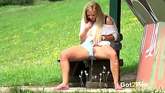 Blonde babe pees in public and gets her panties soaked!