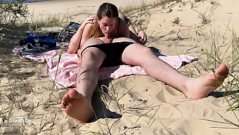 Naked Couple Indulges In Oral Pleasure On The Beach