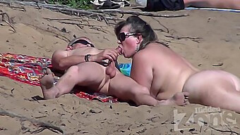 Spycam Captures A Steamy Encounter On A Nudist Beach